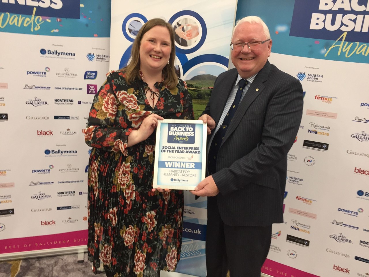 ReStore Ballymena manager Isobel Kerr receiving the store's award for Social Enterprise of the year at the Ballymena Business Awards